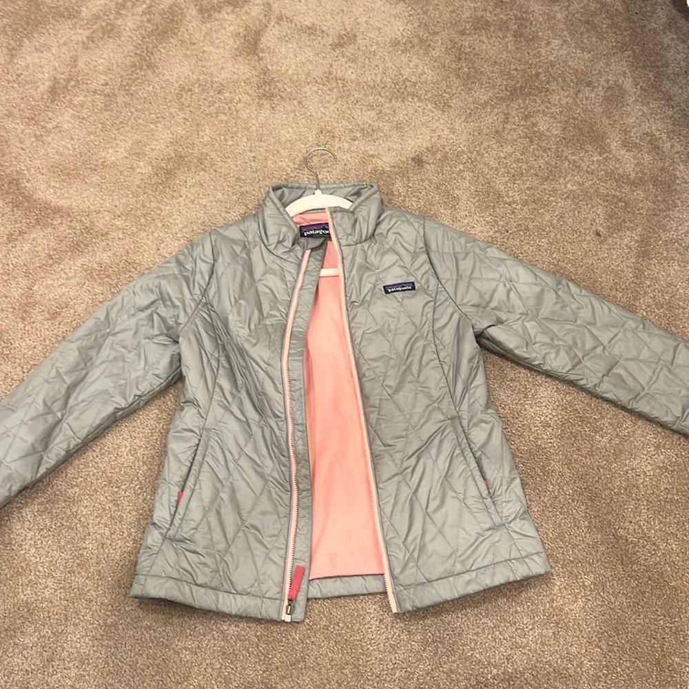 gray jacket that’s pink on the inside, super light weight
